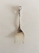 Georg Jensen 
Sterling Silver 
Blossom No 84 
Sardine Fork No 
67. Measures 
14.1 cm / 5 
35/64 in.