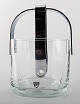 Orrefors swedish art glass ice bucket with ice tongs in stainless steel.
