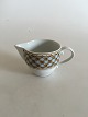 Royal 
Copenhagen 
Liselund 
Creamer No 394. 
Measures 6cm x 
11,5cm.