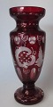 Bohemian 
crystal vase, 
20th century. 
Glass with red 
overlay. With 
cuts in the 
form of 
rocailles ...