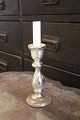 Old candlestick in mercury glass with fine patina.Height: 19,5cm.