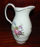 Royal 
Copenhagen 
Frijsenborg 
pitcher in 
porcelain with 
floral 
painting. Model 
no. 1609. In 
...