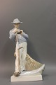 Royal. Figure 
No. 685, man 
with a scythe. 
Height 26 cm.
