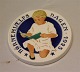 1925 Child 
reading in a 
book Oscar 
Willerup 8.7 cm 
Royal 
Copenhagen 
Aluminia 
Faience 
Children ...