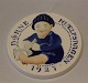 1927 Child 
taking off 
socks Oscar 
Willerup 8.7 cm 
Royal 
Copenhagen 
Aluminia 
Faience 
Children ...