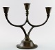 Just Andersen, candlestick in patinated metal.

