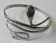 Arm ring in 
sterling 
silver, 20th 
century. 
Decoration in 
the form of a 
snake. Stamped: 
925. Dia ...
