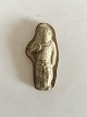 Royal 
Copenhagen 
Stoneware 
Relief figurine 
of man with 
knife. Measures 
9cm.