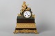 Antique Mental clock with playing man Bronze and partly gilded. Clock brand is Lenzkirch. H: ...