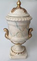 Vase-shaped 
vase with lid, 
earthenware, 
marbled gilt, 
19th century. 
Presumably 
Germany. 
Handles ...