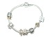 Pandora 
bracelet with 
charms
2 gold charms
5 Silver 
Charms
Length 18 cm.
Beautiful ...