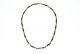 Elegant 
necklace, 14 
karat gold