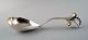 Hans Hansen spoon in sterling silver with lily motif.
