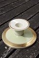 Dagmar with 
gold rim China 
porcelain 
dinnerware by 
Royal 
Copenhagen, 
Denmark. 
Candlestick No 
...