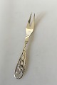 Georg Jensen 
Silver 
Ornamental Cold 
Meat Fork No 
70. Measures 15 
cm / 5 29/32 
in.
