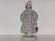 Royal Copenhagen
Rare Art Nouveau figurine - Girl in fancy coat 
with umbrella and book