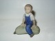 Royal 
Copenhagen 
Figurine
Boy sitting on 
Pumpkin
Decoration 
number 4539
Factory ...