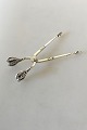 Georg Jensen 
Sterling Silver 
Ornamental 
Sugar Tongs. 
10.5 cm / 4 
9/64". From 
1915-1930
