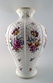 Large Vienna 
vase in 
porcelain. 
Richly 
decorated with 
flowers. 
Hand painted. 
Early 20th ...