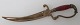 Paper Knife and 
paper holder, 
c. 1900. 
France. In 
brass with 
handle in 
Agate. L .: 12 
cm.