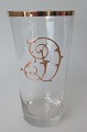 Drinking glass, 
clear glass 
with gilt 
monogram: JD. 
Germany, c. 
1890. H .: 12.5 
cm.