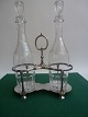 Tantalus in 
stain England 
approx 1870.
With 
associated 
crystal 
decanters.
The tantalus 
is ...