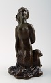 Figure of seated mermaid, designed by Just Andersen.
