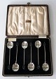 12 pcs. coffee 
spoons in 
silver with 
coffee beans as 
a shank, 
England, 19th 
century. 
Stamped. In ...