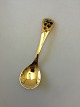Georg Jensen 
Annual Spoon 
1995 in gilded 
Sterling Silver 
with enamel. 
Measures 15 cm 
(5 29/32")