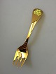 Georg Jensen 
Annual Fork 
1985 in gilded 
Sterling Silver 
with enamel. 
Measures 14,5 
cm (5 45/64")