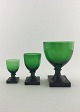 Holmegaard; 
Gorm the Old. A 
Danish green 
glass approx 
1920. H. 7 cm 
(350 kr.), 9 cm 
(450 kr.) ...