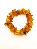 Band of polished amber pieces