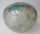 Danish artist 
(20th century.) 
Glass vase. 
Round shape. 
Colored glass. 
Signed. Dia., 
15 cm.