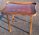 English tray 
table, 19th c. 
Mahogany 
inlays. With 
edge and 
handles in 
brass. 65 x 41 
cm. H .: 56 ...