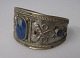 Afghanistan, arm bands, 20th century. Silver plated metal with lapis lazuli. H .: 3.5 cm. Dia .: ...