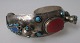 Afghan arm 
bands, 20th 
century. Silver 
plated metal 
with 
decorations and 
turquoises, 
Lapus ...