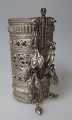 Afghan Arm ring, 20th century. Silver-plated metal. With numerous decorations. Openwork. With ...