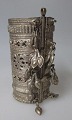 Afghan Arm 
ring, 20th 
century. 
Silver-plated 
metal. With 
numerous 
decorations. 
Openwork. With 
...