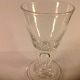 Masonic glass.
cone-shaped 
bowl,
hollow stem 
further to the 
bowl.
attached foot.
1800 ...