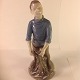 Figurines.
Fishing Boy 
with fishing 
nets
Bing & 
Grondahl B & G 
no. 2338
First ...