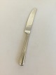 Georg Jensen 
Stainless 
'Copenhagen 
Line, Matte' 
Dinner knife. 
Measures 22 cm 
/ 8 21/32 in.