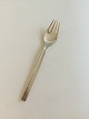 Georg Jensen 
Stainless 
Tuja/Tanaqvil 
Dinner Fork. 
Measures 19 cm 
/ 7 31/64 in.