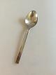 Georg Jensen 
Stainless 
Tuja/Tanaqvil 
Dessert Spoon. 
Measures 17.7 
cm / 6 31/32 
in.