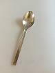 Georg Jensen 
Stainless 
Tuja/Tanaqvil 
Dinner Spoon. 
Measures 19.3 
cm / 7 19/32 
in.