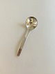 Georg Jensen 
Stainless 
Tuja/Tanaqvil 
Serving Spoon 
(Dressing 
Spoon). 
Measures 13.4 
cm / 5 9/32 in.