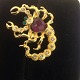 Brooch.
Scorpio with 
crystals.
Gold plated 
metal.
Length: 4.5 
cm. Width: 3.5 
...