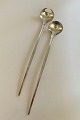 Georg Jensen 
Stainless 
Tuja/Tanaqvil 
Serving Set. 
Both pieces 
measures 32 cm 
/ 12 18/32 in.