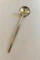 Georg Jensen 
Stainless 
Tuja/Tanaqvil 
Serving Spoon. 
Measures 21 cm 
/ 8 17/64 in.