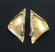 Ole Lynggaard. A pair of diamond ear clips of 14k gold