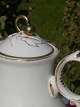 CT porcelain. 
Beautiful 
chocolate pot 
and 5 cups 
w.high handle.